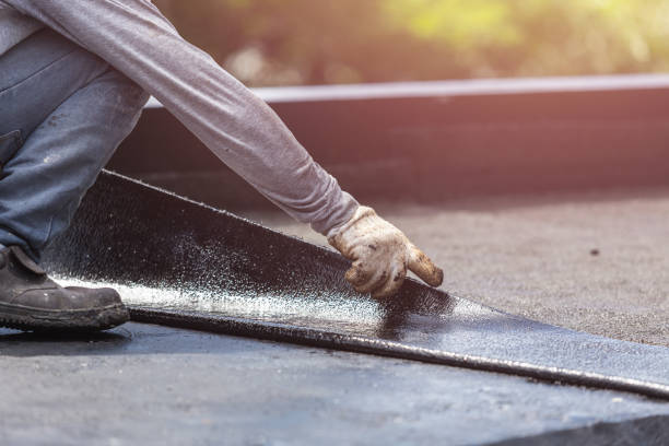 Professional Waterproofing technician working in Bath, NY